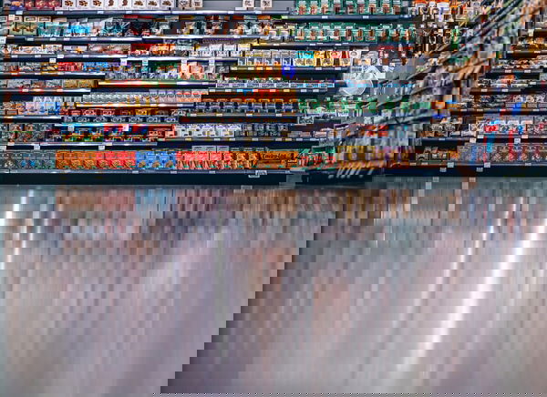 Slick floors in a grocery store isle