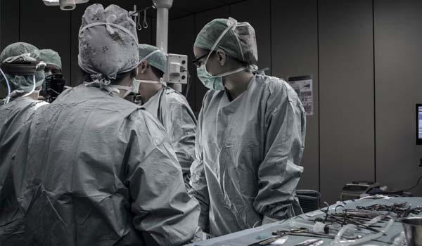 Doctors Performing Surgery